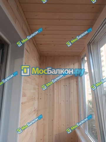 Отделка балконов деревянной вагонкой в Москве